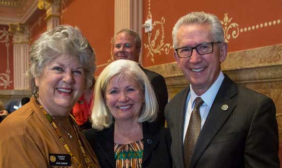 State Senator Nancy Todd (left) joins Dr. Jordan and his wife, Ruthie, during the Colorado Legislature’s ceremony that honored him for his 12 years of service to MSU Denver.