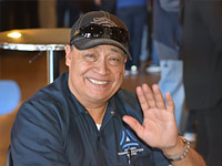 Photo of Carlos Moreno waving at the camera