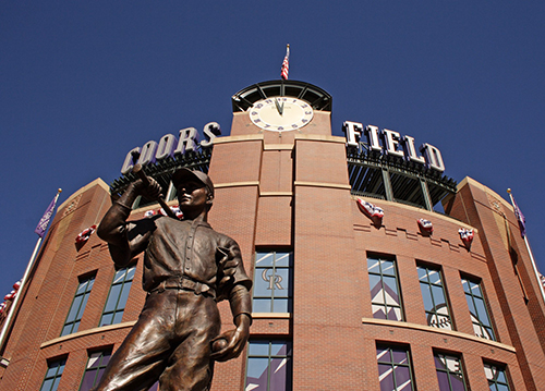 Coors Field with statue in-front