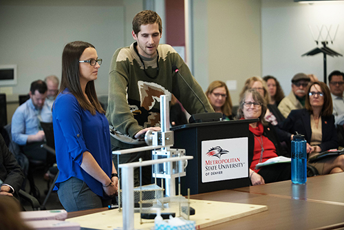 Student showcase their winning design at a recent Board of Trustees meeting. Photo: Mark Stahl