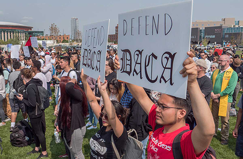 Auraria Campus students hold signs in support for DACA