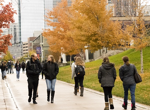 Students walking in fall