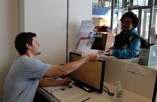 students at registrars desk