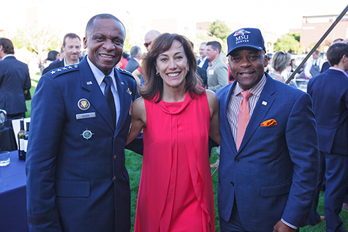 President Janine Davidson, Ph.D., stands with Gen. Darren W. McDew (left) and Denver Mayor Michael B. Hancock (right) at Davidson