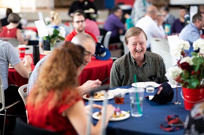 Employee being recognized at Roadrunners Who Soar event