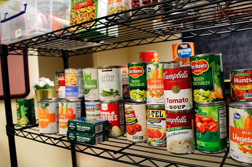 Food pantry shelf with canned items