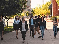 Student Government Assembly members walking on campus