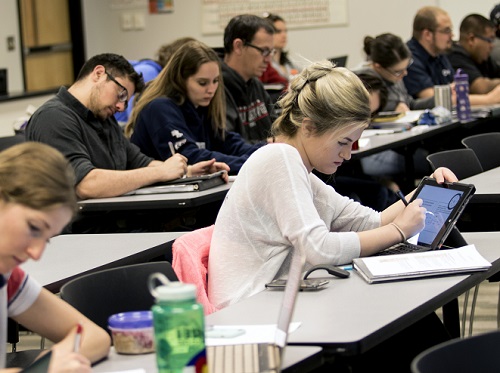 Students studying in classroom