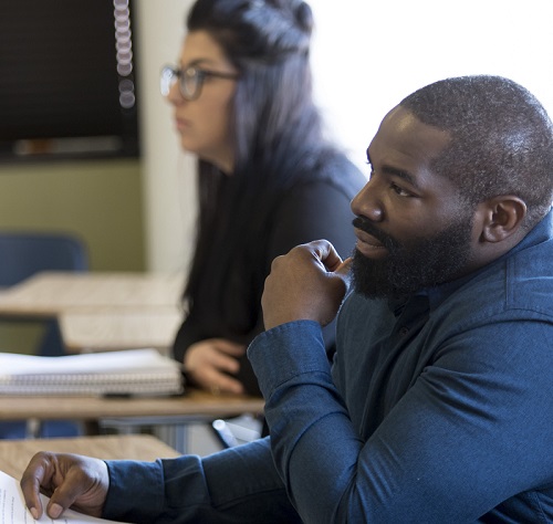 Students in classroom sitting in desks