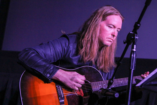 Dave Devine playing guitar