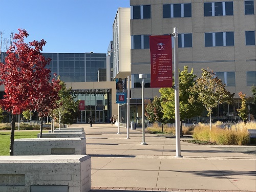 Jordan Student Success Building exterior with fall colors