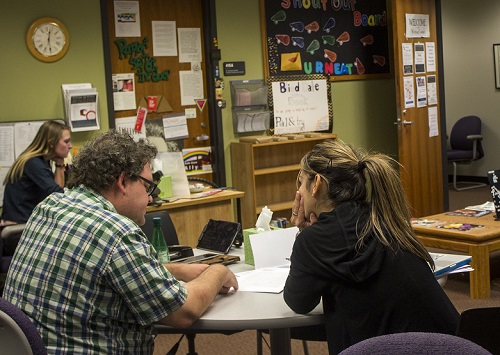 Students receiving assistance in the Writing Center