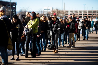 Students and parents waiting in line to enter Open House.