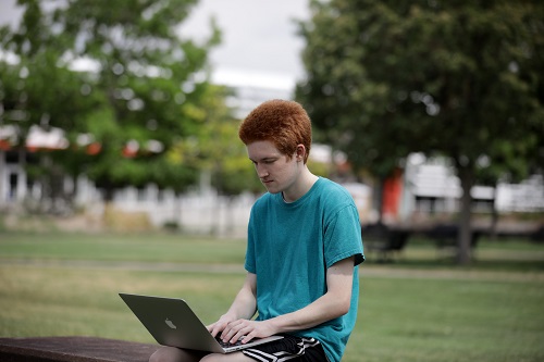 Student working on a laptop.