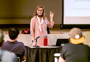 Cindy Krentz, DNP, teaching a capstone course in St. Cajetan's Event Center.
