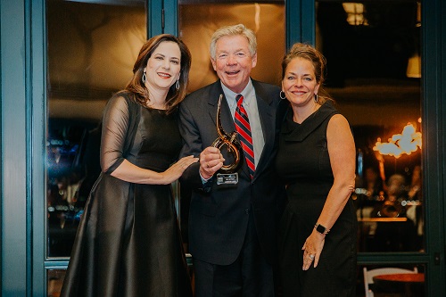 Jackson Lamb accepting Lifetime Achievement Award from CRA officials.